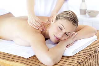 Woman having a deep tissue massage