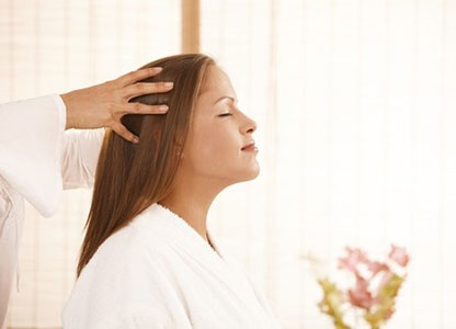 woman having an Indian Head Massage treatment