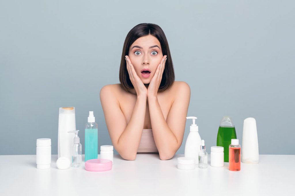 Woman choosing effective skincare products